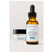 Skinceuticals skincare products including a dropper bottle and cream on a light background